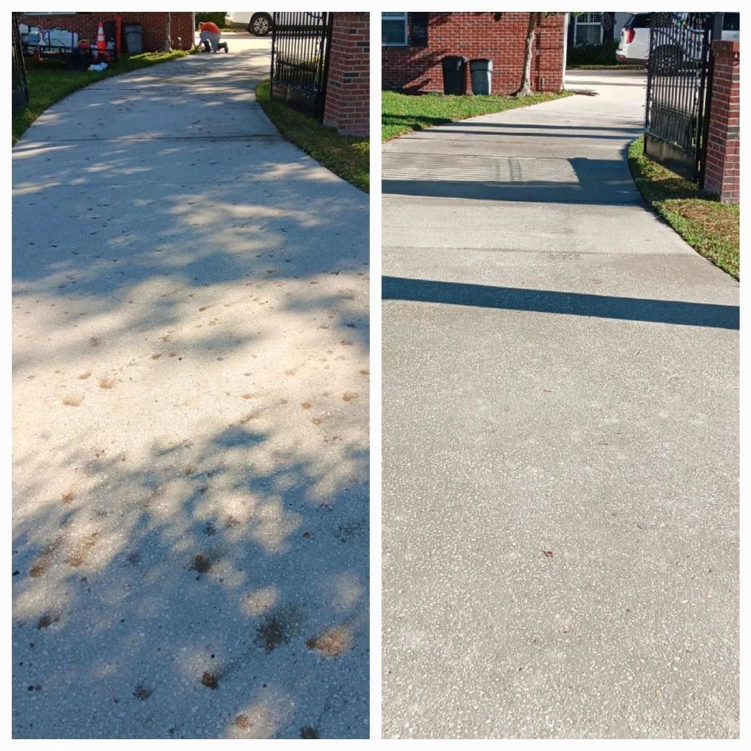 Driveway before and after pressure washing. Photo from the Coastal Revive gallery.